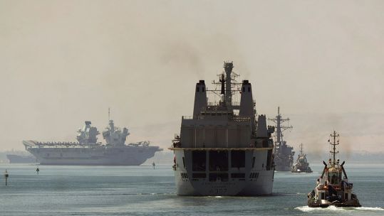 RFA Fort Victoria, USS The Sullivans and HMS Queen Elizabeth transit through the Suez Canal after completing operations in the Mediterranean on Carrier Strike Group 21 060721 CREDIT MOD