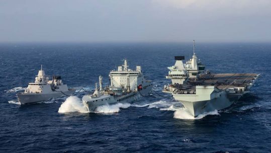 RFA Tidespring carrying out a fuel replenishment at sea during the Carrier Strike Group 21 deployment