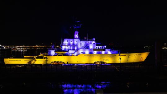 RN HMS Mersey adorned in the Ukrainian colours of blue and yellow coinciding with Eurovision 14052023 CREDIT MOD Crown Copyright