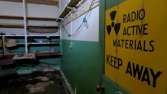 Radioactive materials sign in a forgotten Cold War bunker on Devonport Naval Base