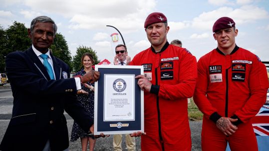 Red Devils awarded Guinness World Record certificate for flag downplaning 220722 CREDIT Red Devils Twitter.jpg
