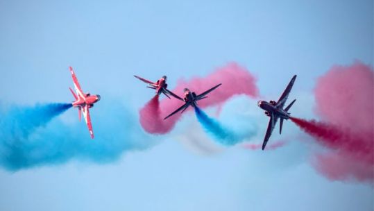 The Red Arrows practise their manoeuvres earlier this year 