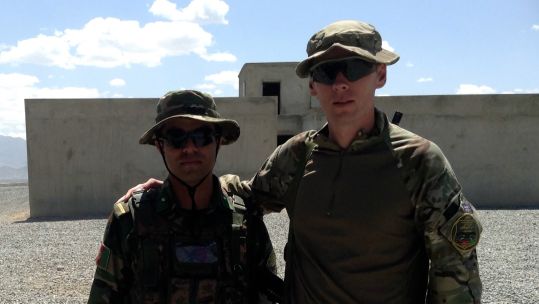 Retired Army Captain John Carson (right) with Former Afghan National Army Officer Abdul DATE UNKNOWN CREDIT John Carson, Abdul