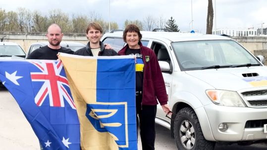 Retired Australian vet Dr Claire Oelrichs driving a donated vehicle from London to Ukraine