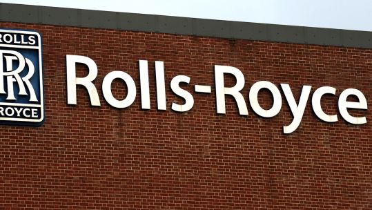 Rolls-Royce sign on building (Picture: PA).