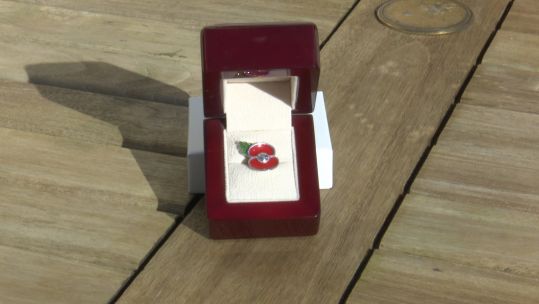 Royal British Legion Aluminium Poppy Pin Made From Reclaimed World War Metals 05112020 CREDIT BFBS