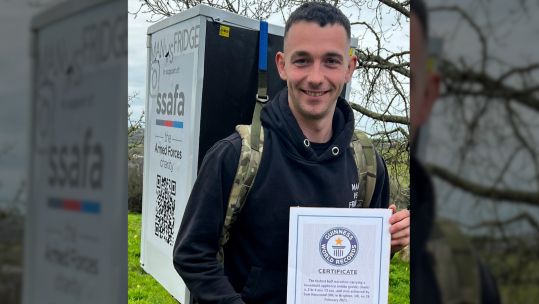 A serving Royal Marine, Sam Hammond has become a two time world record holder after carrying a fridge on his back during the London Marathon (Picture: Sam Hammond).