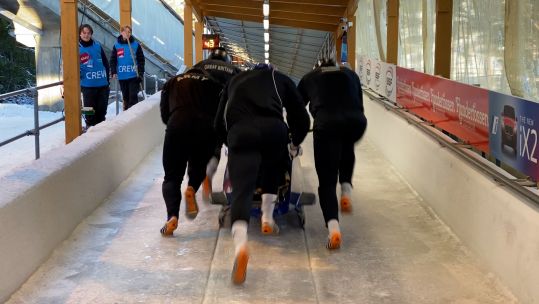 Royal Marine Sergeant Adam Baird setting off down the bobsleigh track in Lillehammer, Norway 060224 CREDIT BFBS