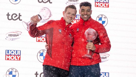Royal Marine Taylor Lawrence alongside driver (left) Brad Hall, World Cup finale overall bronze 19022023 CREDIT IBSF, Viesturs Lācis.jpg