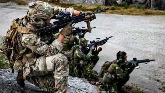 Royal Marine of 45 Commando and Swedish Coastal Rangers Baltic Operations (BALTOPS) Sweden 110624 CREDIT MOD