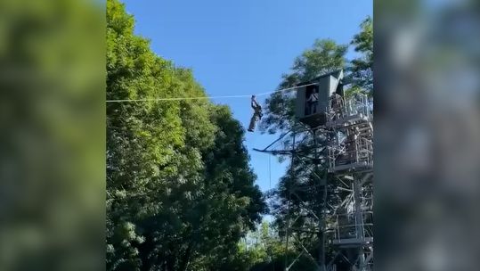 Royal Marine recruits taking on the Tarzan assualt course at the Commando Training Centre Royal Marines