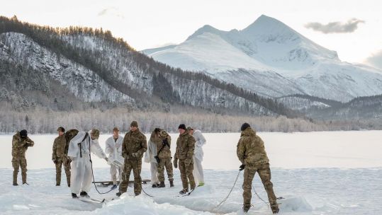 Royal Marines breaking the ice during their Cold Weather Survival Course Credit Royal Navy 260120