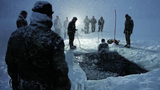 Personnel take part in an infamous ice-breaking drill (Picture: Royal Navy).