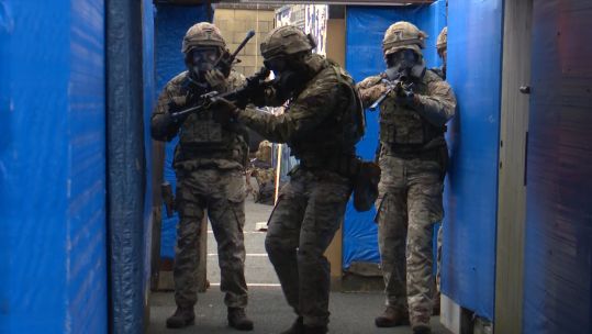 Royal Marines go door to door in scotland police college