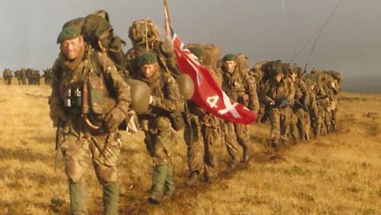 Royal Marines yomp across the Falklands in an effort to capture the Two Sisters (Picture: Alan Roberts).