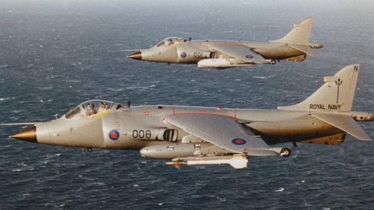 Royal Navy FRS.1 Sea Harriers flying off the cost of the Falkland Islands (Picture: MOD/Crown Copyright)