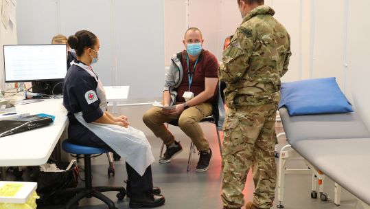 Royal Navy medic at Bristol Coronavirus vaccination hub Ashton Gate 140121 CREDIT MOD CROWN COPYRIGHT .jpg