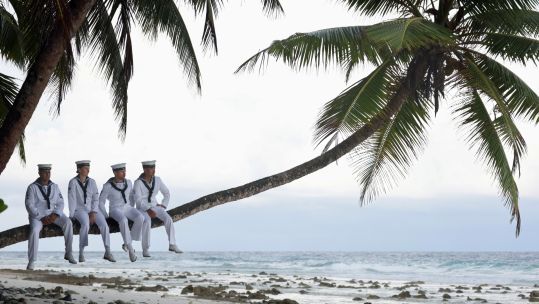 Royal Navy personnel from HMS Tamar are seen on a beach in Diego Garcia (Picture: MOD).