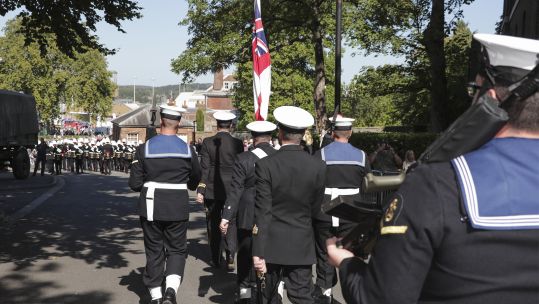Royal Navy personnel marching