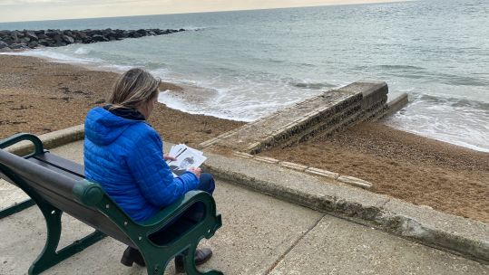 Royal Signals veteran Gina Allsop with her poetry book Military Memories 190122 CREDIT BFBS