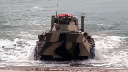 Russian Military Vehicles Storm Beach