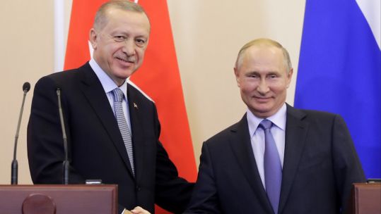 Russian President Vladimir Putin shakes hands with Turkish President Recep Tayyip Erdoğan (Picture: PA).