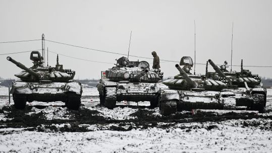 Russian tanks near border with Ukraine where Moscow has massed an estimated 100,000 troops
