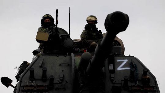 Russian armed forces in an armed vehicle marked with the letter 'Z' (Picture: Russian MOD).