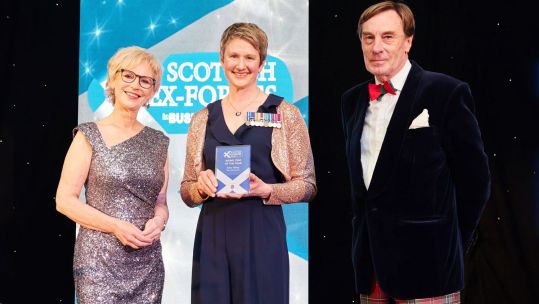 Sally Magnusson, left and Jon Strickland of The MacRobert Trust, right, present Katie Hislop of Mott MacDonald, centre, the Rising Star of the Year award in 2023 CREDIT Ex-Forces in Business Awards