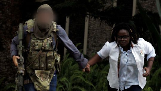 The soldier was spotted by locals standing by (Picture: Reuters).