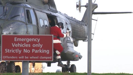 Santa arriving at the John Radcliffe Hospital in Oxford via a Puma Credit BFBS 11.12.19