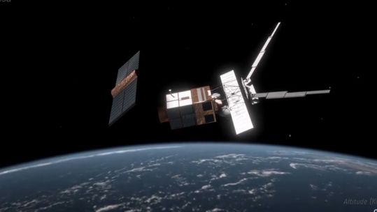 Satellite in space panning down to Earth