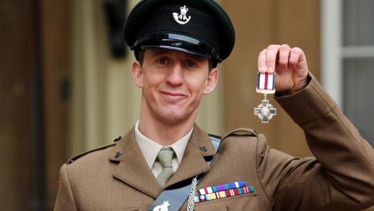Serjeant Deacon Cutterham with his Conspicuous Gallantry Cross medal following a ceremony at Buckingham Palace 