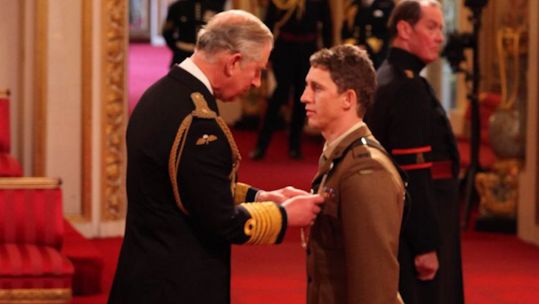 Serjeant Deacon Cutterham, The Rifles, decorated with The Conspicuous Gallantry Cross by the Prince Charles for services in Afghanistan (Picture: PA).