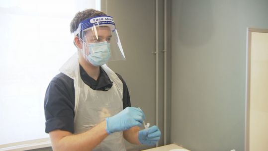 Serviceman in Greater Manchester prepares to support with one of the last few tests in the region after 7 weeks of testing covid coronavirus 260221 CREDIT BFBS