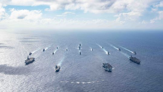 Ships deployed on the Carrier Strike Group 21 deployment carrying out quad carrier operations alongside the US and Japanese navies