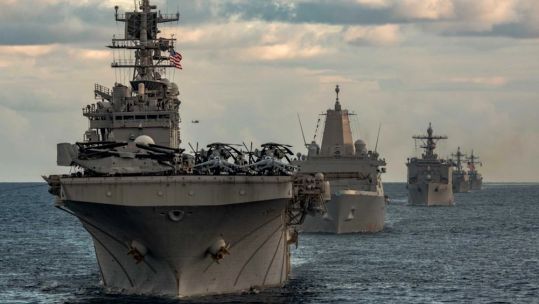 Ships from the Gerald R Ford Carrier Strike Group and the Bataan Amphibious Ready Group sail through the Mediterranean Sea (Picture: US Dept of Defense).