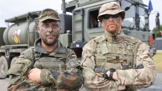 Shoulder to shoulder, soldiers of 130 battalion