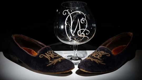 Slippers and a brandy balloon previously belonging to Sir Winston Churchill