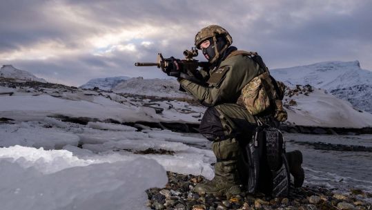 Cover image: Small teams of Royal Marines conduct reconnaissance training in the Arctic Circle (Picture: Royal Navy).