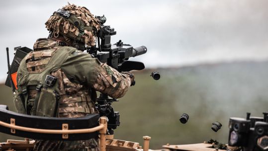 Soldier from the 2nd Battalion The Royal Gurkha Rifles fire a grenade machine gun Exercise Wessex Storm 170423 CREDIT MOD