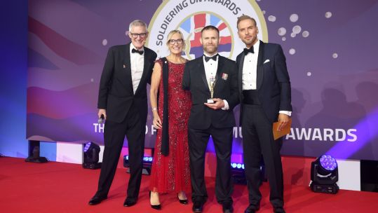 Soldiering On Awards 2025- Host Jeremy Vine, and award sponsor Julie Baker from NatWest celebrated with Inspirational Award winner Mark Ormrod MBE and singer Matt Goss, who presented the accolade. Credit Soldiering on awards 23.10.25