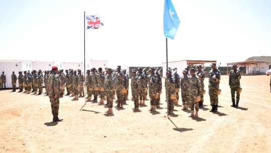 Cover image: Soldiers and officers from 8 Brigade, Somalia National Army at their graduation ceremony after completing their 8 week infantry training in Baidoa, Somalia (Picture: MOD).