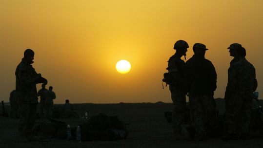 Cover image: British soldiers pictured during the Iraw War in 2003 (file photo) (Picture: PA).