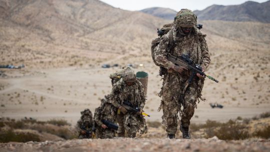 Members of 2 R Yorks' Recce Platoon patrol towards their OP