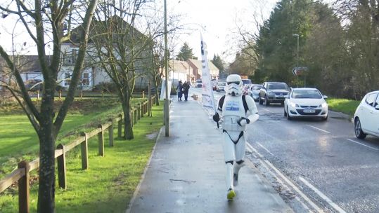 Squadron Leader Jez Allinson running as a Stormtrooper