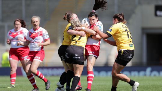St Helens' Carrie Roberts is tackled during the Women's Challenge Cup final