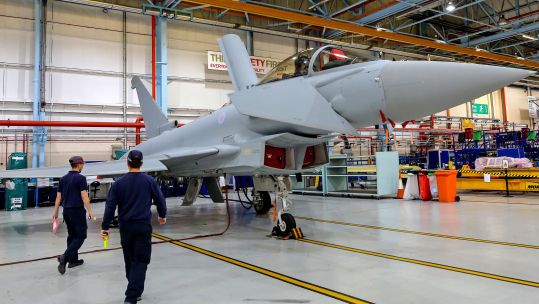 Cover image: Staff at BAE Warton in Lancashire (Picture: PA).