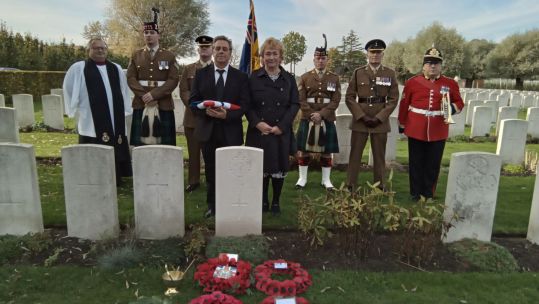 Stephen Gore, great nephew of Pte Parry is pictured with his wife Julie at the grave CREDIT Crown Copyright