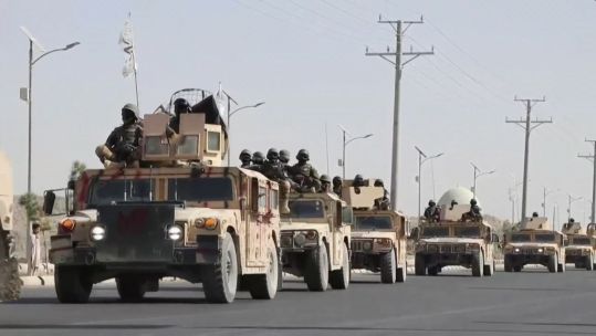 Taliban parade in what appears to be western military vehicles in Kandahar, Afghanistan 